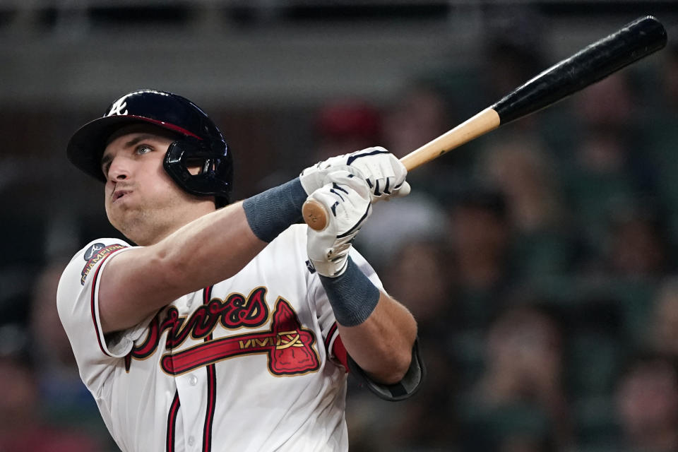 Atlanta Braves' Austin Riley watches his two-run home run against Oakland Athletics during the fifth inning of a baseball game Wednesday, June 8, 2022, in Atlanta. (AP Photo/John Bazemore)