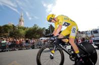 Cycling - The 104th Tour de France cycling race - The 22.5-km individual time trial Stage 20 from Marseille to Marseille, France - July 22, 2017 - Team Sky rider and yellow jersey Chris Froome of Britain in action with the Notre Dame de la Garde basilica in the background. REUTERS/Jean-Paul Pelissier