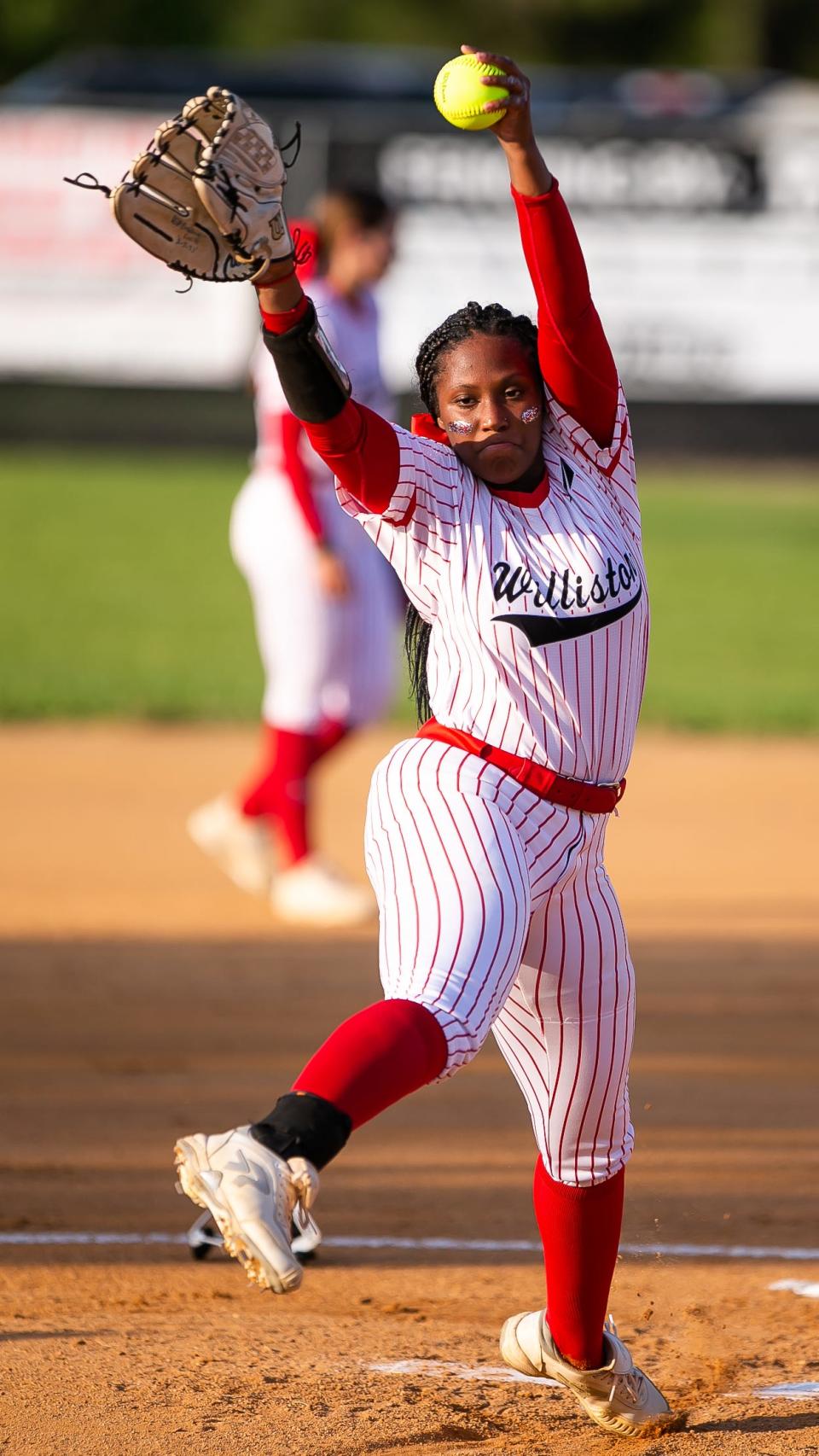 Williston Red Devils Nevaeh Hayes (6) pitches in the first inning. Williston Red Devils softball hosts Dixie County Bears in regional championship at Williston High School in Williston, FL on Tuesday, May 16, 2023. Dixie County defeated Williston 5-3 and advances to states. [Doug Engle/Gainesville Sun]