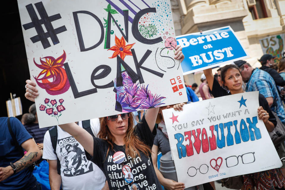 Demonstrators protest outside the DNC