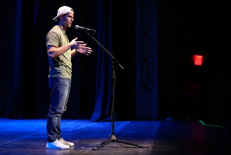 Cody Goodwin tells his story during the Des Moines Register's Storytellers Project at Hoyt-Sherman Place in Des Moines on Tuesday, Oct. 25, 2022.