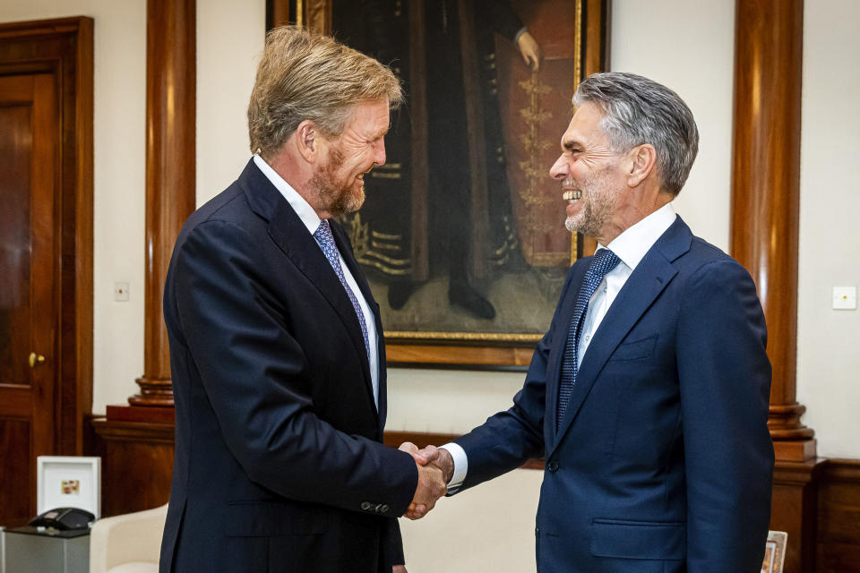 Dutch King Willem-Alexander meets with incoming Prime Minister Dick Schoof, right, in The Hague, Netherlands, Monday, July 1, 2024. (Patrick van Katwijk/Pool Photo via AP)