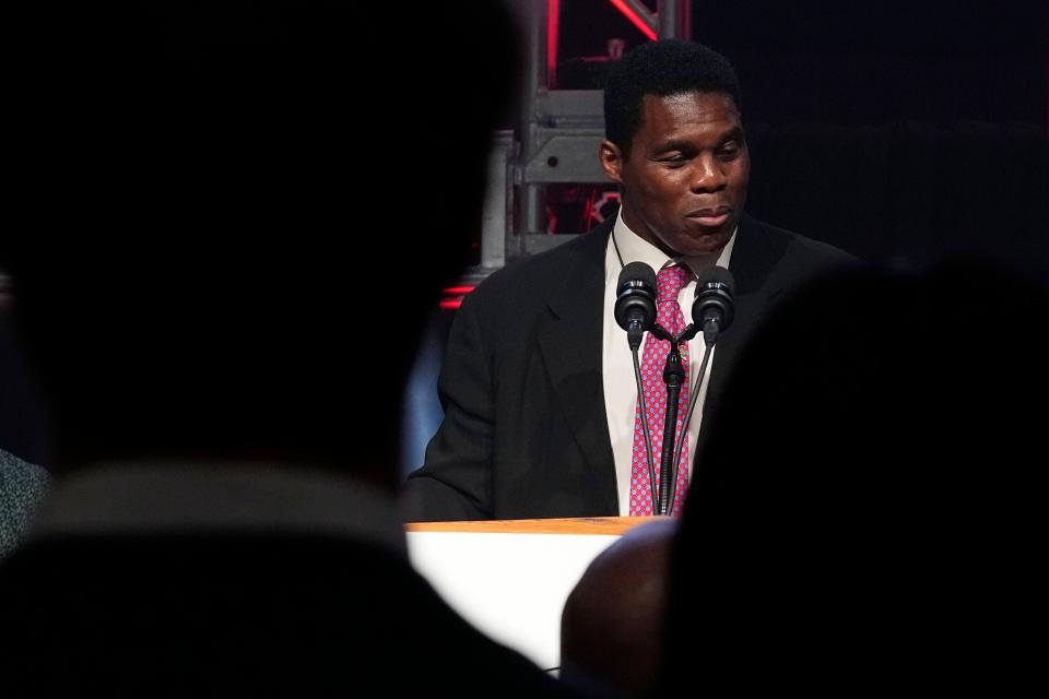 Republican Senate challenger Herschel Walker speaks during an election night watch party, Tuesday, Dec. 6, 2022, in Atlanta.