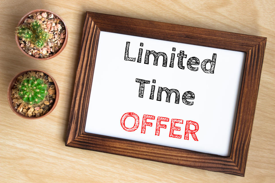 Limited time offer written on a wooden frame board.