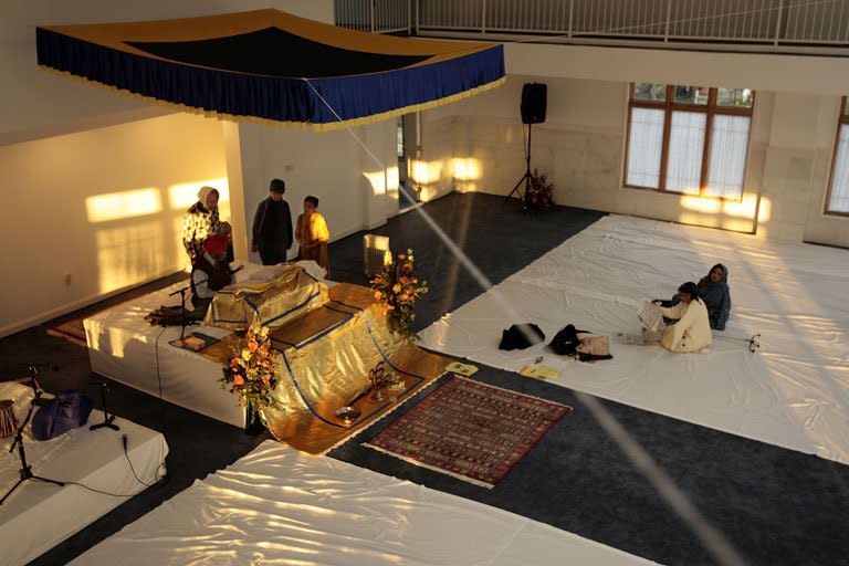 Visitors pass through the temple area of the new National Gurdwara - or house of God - and Sikh Cultural Center on February 18, 2006 in Washington, DC