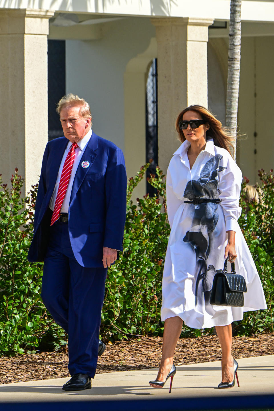Former US President and Republican presidential candidate Donald Trump (L) and former First Lady Melania Trump leave after voting in Florida's primary election at a polling station at the Morton and Barbara Mandel Recreation Center in Palm Beach, Florida, on March 19, 2024. (Photo by GIORGIO VIERA / AFP) (Photo by GIORGIO VIERA/AFP via Getty Images)
