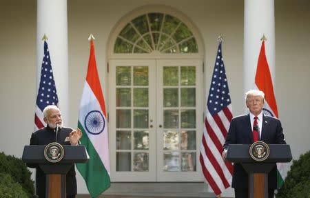 U.S. President Donald Trump (R) holds a joint news conference with Indian Prime Minister Narendra Modi in the Rose Garden of the White House in Washington, U.S., June 26, 2017. REUTERS/Kevin Lamarque