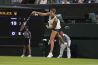 Aryna Sabalenka of Belarus serves to Hungary's Panna Udvardy during the first round singles match on day two of the Wimbledon tennis championships in London, Tuesday, July 4, 2023. (AP Photo/Alberto Pezzali)