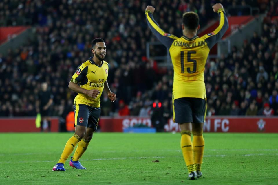 Theo Walcott and Alex Chamberlain celebrate in the Emirates FA Cup