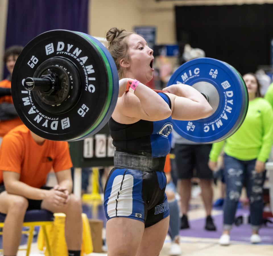 Emma Heck won both traditional and Olympic weightlifting titles to help Clay to the Class 2A girls team championship.