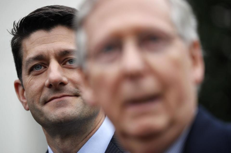 House Speaker Paul Ryan of Wis. listens at left as Senate Majority Leader Mitch McConnell of Ky. speaks to reporters outside the White House in Washington, Monday, Feb. 27, 2017, following their meeting with President Donald Trump inside. (AP Photo/Pablo Martinez Monsivais)