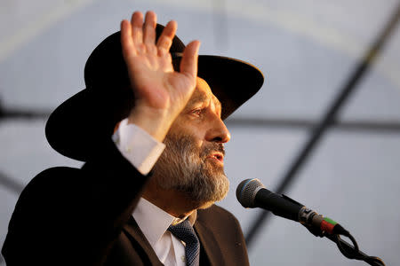 FILE PHOTO: Israeli Interior Minister Aryeh Deri speaks during an annual pilgrimage to the gravesite of Moroccan-born sage and Jewish mystic Rabbi Yisrael Abuhatzeira, also known as the Baba Sali, on the anniversary of his death in the southern town of Netivot, Israel January 9, 2019 REUTERS/Amir Cohen/File Photo