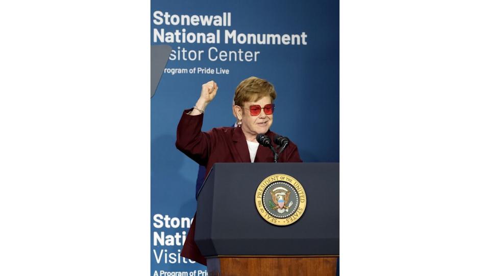  Elton John speaks onstage 