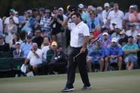 Patrick Reed of the U.S. finishes the day on the 18th green during second round play of the 2018 Masters golf tournament at the Augusta National Golf Club in Augusta, Georgia, U.S., April 6, 2018. REUTERS/Mike Segar