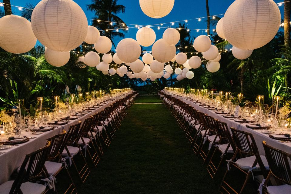 Guests walked along a torchlit path to dinner, where we had two long tables bathed in candlelight with paper lanterns hung over the dining area. We placed 24 bottles of Clase Azul Reposado tequila along the tables, along with shot glasses, limes, and salt.