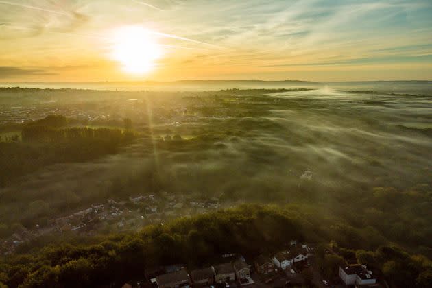 Low mist forms at sunrise over Bristol as the UK leaves summer behind. (Photo: Ben Birchall - PA Images via Getty Images)