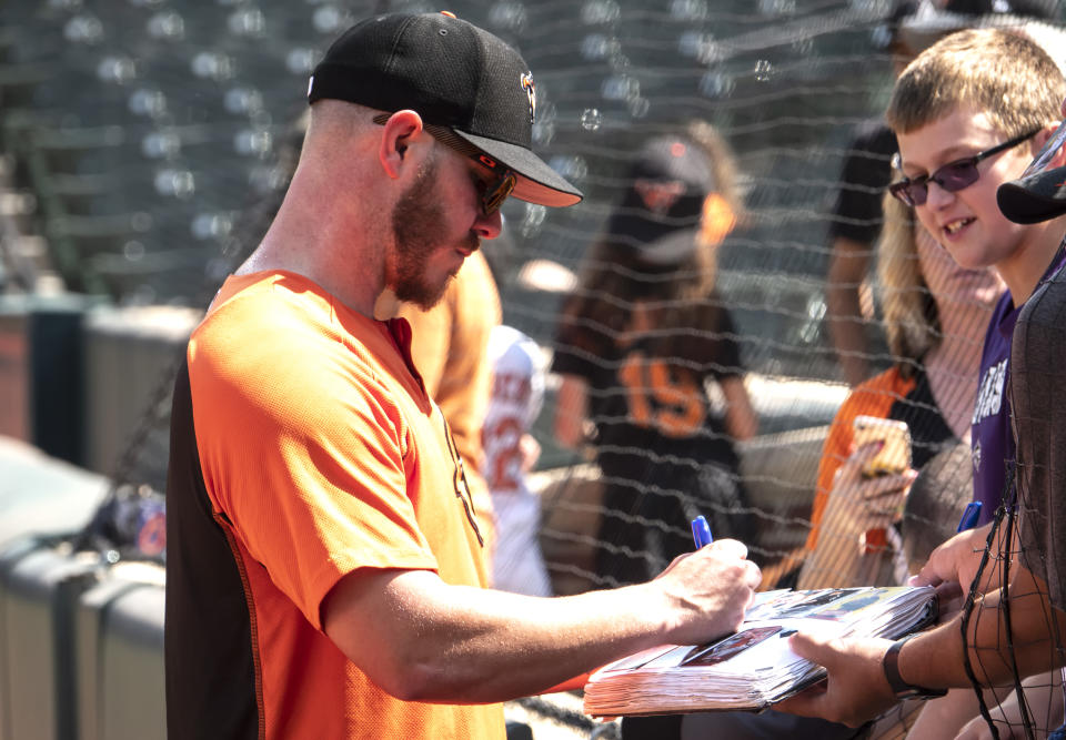 BALTIMORE, MD - SEPTEMBER 08: Baltimore Orioles starting pitcher Dylan Bundy (37) signs before a MLB game between the Baltimore Orioles and the Texas Rangers on September 08, 2019, at Oriole Park at Camden Yards, in Baltimore, Maryland.  (Photo by Tony Quinn/Icon Sportswire via Getty Images)