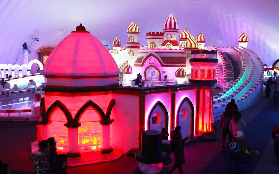 <p>A candy cane ice sculpture on view at the Ice and Snow World atthe festival in Harbin.</p>