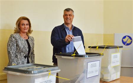 Kosovo Prime Minister Hashim Thaci votes in the capital Pristina , November 3, 2013. REUTERS/Hazir Reka
