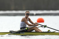 Emma Twigg, of New Zealand reacts after winning the gold medal in the women's rowing single sculls final at the 2020 Summer Olympics, Friday, July 30, 2021, in Tokyo, Japan. (AP Photo/Lee Jin-man)