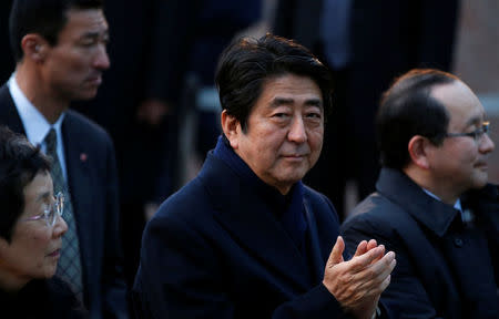 Japan's Prime Minister Shinzo Abe attends a Friday night concert outside a museum in Tokyo, Japan February 24, 2017. REUTERS/Toru Hanai