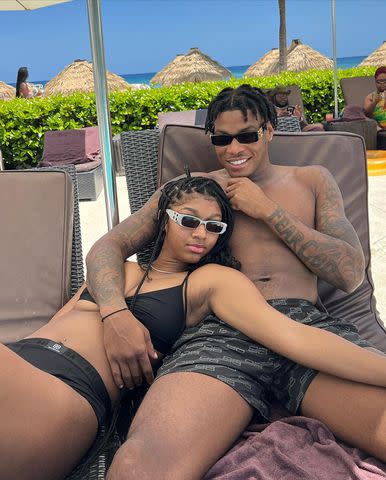 <p>angelreese10/Instagram</p> Angel Reese and ex-boyfriend Cam'Ron Fletcher pose for a photo while on vacation in Jamaica.