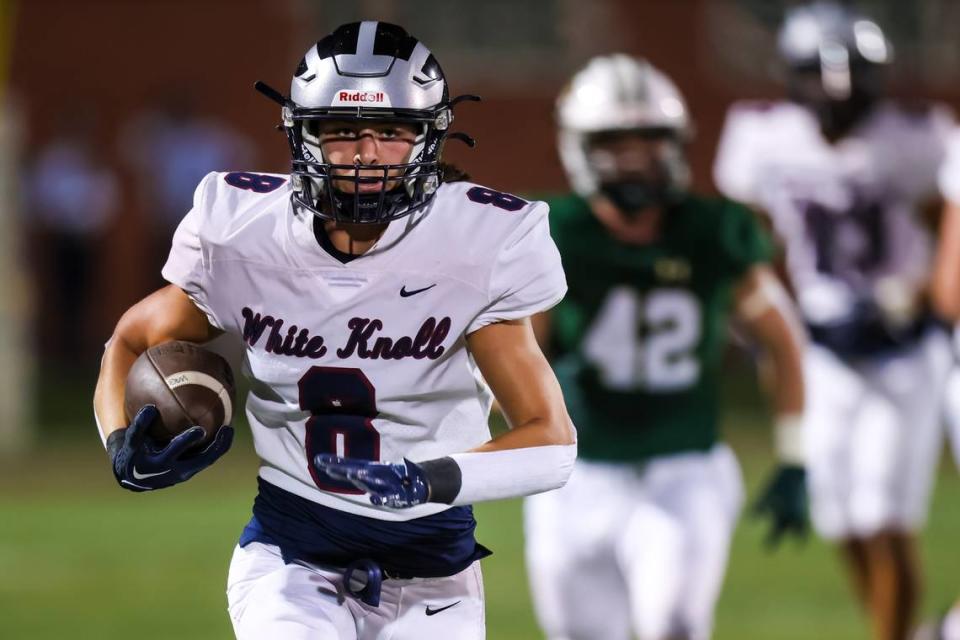 White Knoll Timberwolves wide receiver Austin Cunningham (8) makes a large gain against the River Bluff Gators during their game at River Bluff High School Friday night, Sept. 29, 2023.