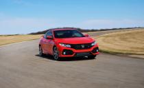 <p>For the Si, Honda adds even more zaniness to the 10th-generation Civic’s already over-the-top styling. The plastic prow that juts out over the grille, between the headlights, is totally blacked out, as are the gaping pseudo-intakes at each front corner.</p>