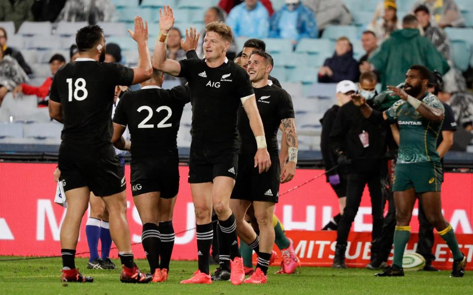 New Zealand players celebrate after winning their Bledisloe rugby test 43-5 against the Wallabies - AP