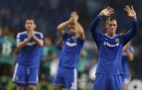 Chelsea's Fernando Torres waves at the end of their Champions League soccer match against Schalke 04 in Gelsenkirchen October 22, 2013. REUTERS/Wolfgang Rattay (GERMANY - Tags: SPORT SOCCER)