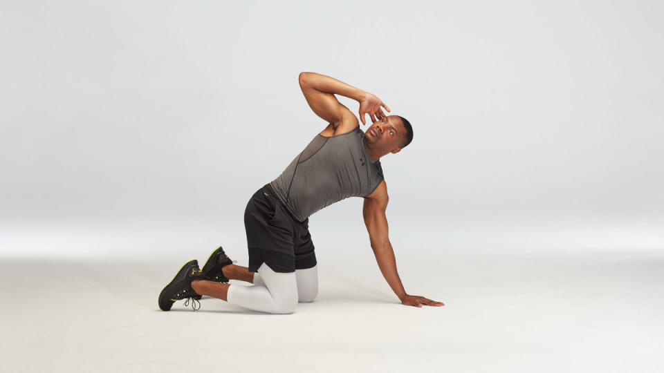 <p>Justin Steele</p>How to Do It<ol><li>Start on hands and knees, right hand cupping right ear, to start. </li><li>Rotate torso so right elbow reaches toward left hand, then reverse until elbow points toward ceiling. </li><li>That's 1 rep. Do this for 2 minutes, switching sides halfway through.</li></ol>
