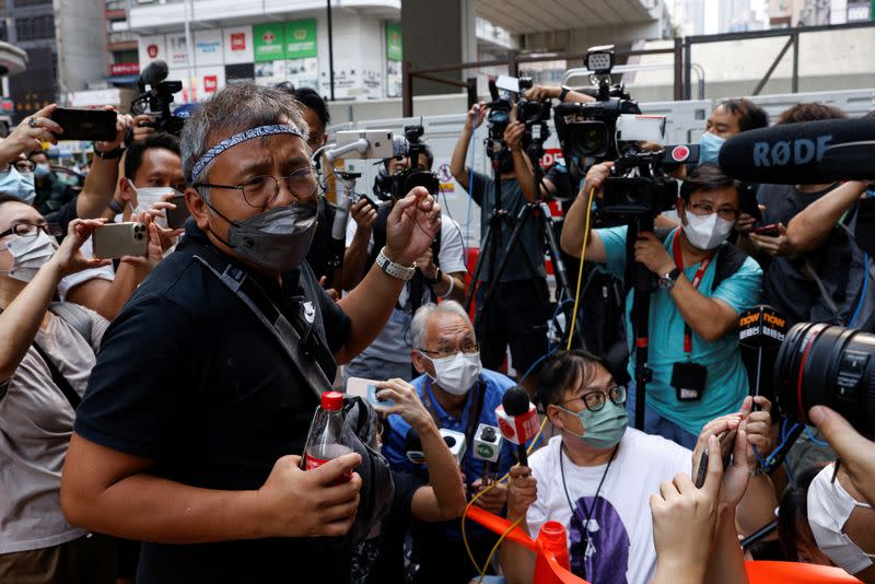 Ronson Chan, chairman of the Hong Kong Journalists Association (HKJA), reports to police over his charge of obstructing police in Hong Kong