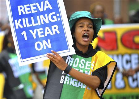 Members of the ruling African National Congress Women's League march in Pretoria on the anniversary of the killing of Reeva Steenkamp, February 14, 2014. REUTERS/Stringer