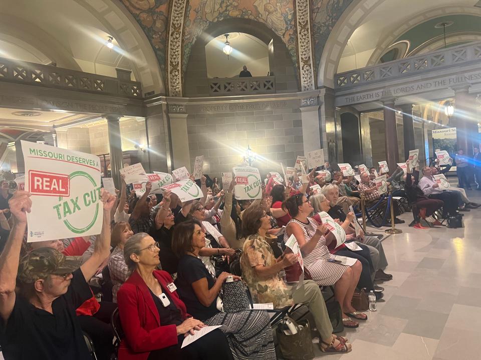 People gather under the Missouri State Capitol rotunda for a rally in favor of tax cuts on Sept. 14, 2022. The rally was led by the Missouri chapter of Americans for Prosperity, a conservative libertarian advocacy group.