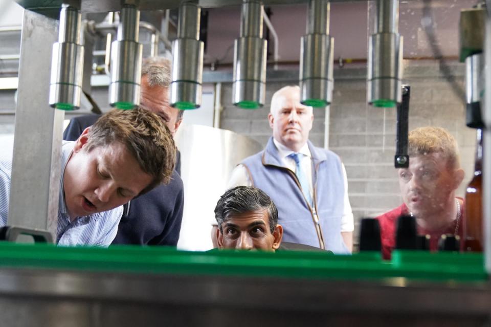 Rishi Sunak visited a brewery in South Wales, where he asked voters if they were looking forward to the Euros (PA)