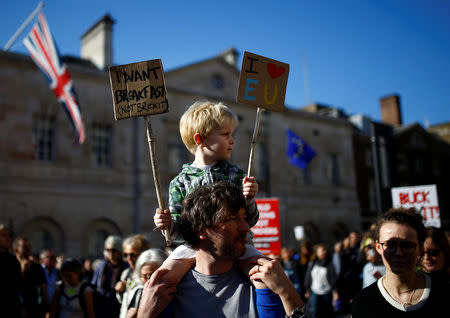 Protesters participating in an anti-Brexit demonstration march through central London, Britain October 20, 2018. REUTERS/Henry Nicholls