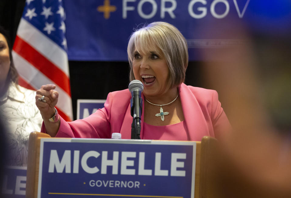Reelected New Mexico Gov. Michelle Lujan Grisham speaks to supporters during the celebration party in Albuquerque, N.M., Tuesday, Nov. 8, 2022. The Democrat incumbent beat Republican candidate Mark Ronchetti. (AP Photo/Andres Leighton)