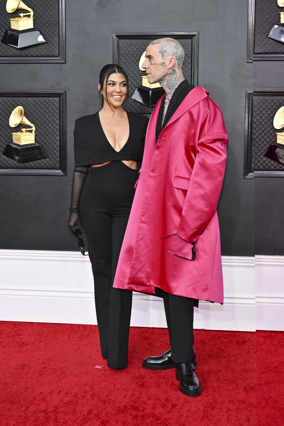 Kourtney Kardashian and Travis Barker at the 64th Annual Grammy Awards held at the MGM Grand Garden Arena on April 3rd, 2022 in Las Vegas, Nevada.