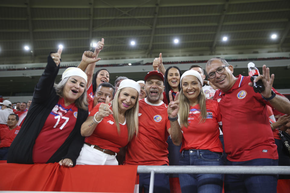 Costa Rica's fans cheer before the World Cup 2022 qualifying play-off soccer match between New Zealand and Costa Rica in Al Rayyan, Qatar, Tuesday, June 14, 2022. (AP Photo/Hussein Sayed)