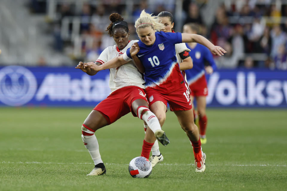 Canada's Kadeisha Buchanan, left, and United States' Lindsey Horan vie for the ball during the first half of a SheBelieves Cup soccer match Tuesday, April 9, 2024, in Columbus, Ohio. (AP Photo/Jay LaPrete)