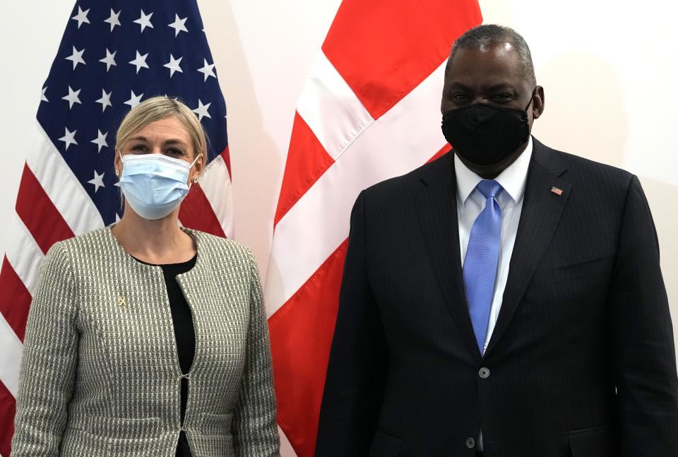 United States Defense Secretary Lloyd J. Austin III, right, poses with Denmark's Defense Minister Trine Bramsen prior to a bilateral meeting at NATO headquarters in Brussels, Thursday, Oct. 21, 2021. NATO defense ministers gather for their fall meeting to assess the fallout of Moscow's closure of its mission to the alliance and an overall worsening of relations with Moscow. (AP Photo/Virginia Mayo, Pool)