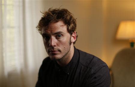 British actor Sam Claflin poses for a portrait while promoting his upcoming movie "The Quiet Ones" at Chateau Marmont in West Hollywood, California April 22, 2014. REUTERS/Mario Anzuoni
