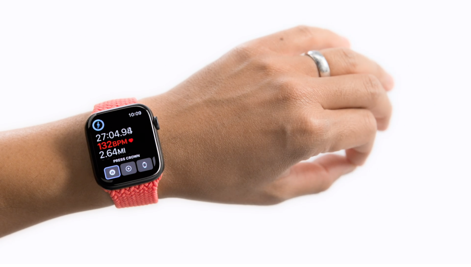 An Apple Watch user demonstrates the pinch movement used as part of the AssistiveTouch feature.