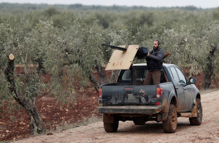 Turkey-backed Free Syrian Army fighters patrol near Menagh, Syria January 21, 2018. REUTERS/Osman Orsal