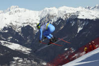 Italy's Christof Innerhofer is airborne during an alpine ski, men's World Championships downhill training, in Courchevel, France, Friday, Feb. 10, 2023. (AP Photo/Alessandro Trovati)