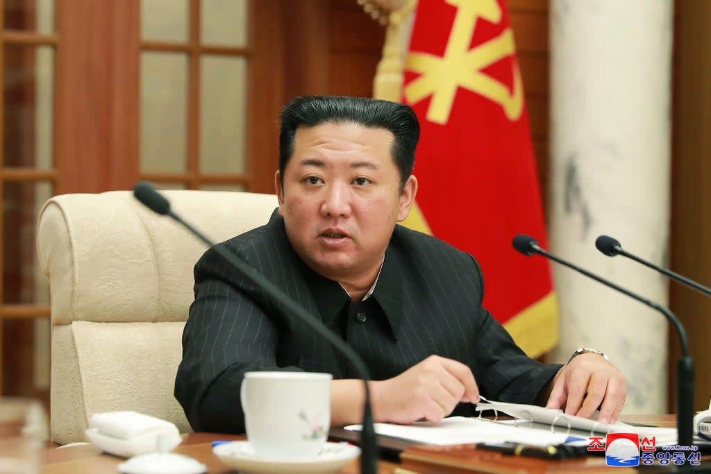 In this photo provided by the North Korean government, leader Kim Jong Un attends a meeting of the Central Committee of the ruling Workers’ Party in Pyongyang on 19 January (AP)