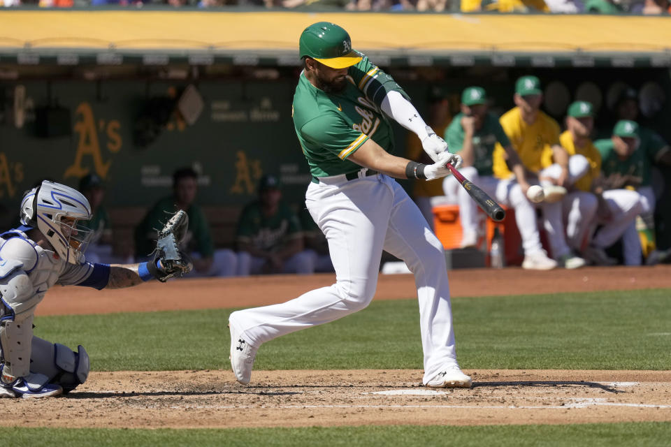 Oakland Athletics' Dermis Garcia hits a double to drive in two runs against the New York Mets during the first inning of a baseball game in Oakland, Calif., Saturday, Sept. 24, 2022. (AP Photo/Tony Avelar)