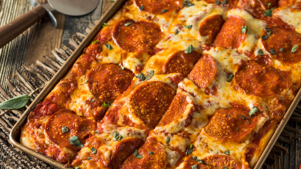 Originating in Sicily, Italy, Sicilian pizza is thick and topped with fresh herbs.