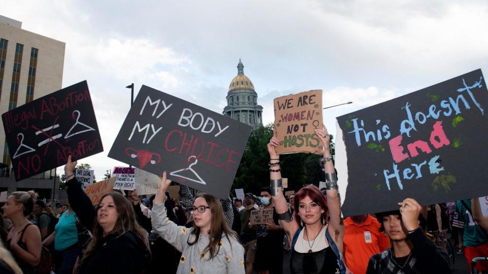 PHOTO: Abortion rights activists march in protest after the overturning of Roe Vs. Wade by the Supreme Court, in Denver, June 24, 2022.  (Jason Connolly/AFP via Getty Images)