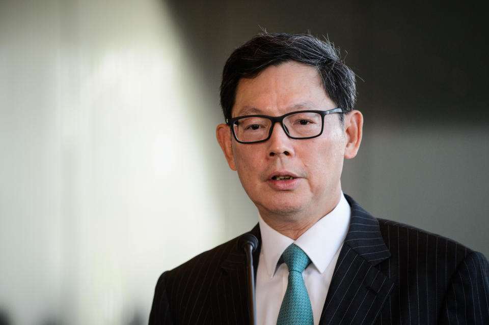 Hong Kong Monetary Authority (HKMA) Chief Executive Norman Chan (R) holds a press conference in Hong Kong on June 24, 2016, following the results of the UK Brexit referendum. 
Britain has voted to break out of the European Union, national media declared on June 24, striking a thunderous blow against the bloc and spreading alarm through markets as sterling plummeted to a 31-year low against the dollar. / AFP / ANTHONY WALLACE        (Photo credit should read ANTHONY WALLACE/AFP via Getty Images)